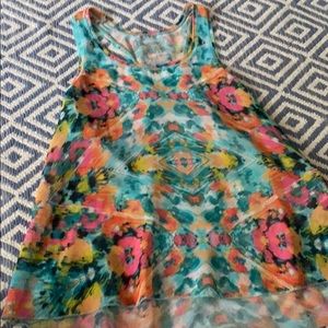 A coverup top with bright patterns